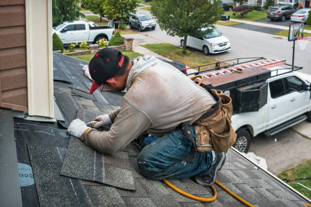 Professional Gutter Repair And Installation technician working in Caldwell, TX